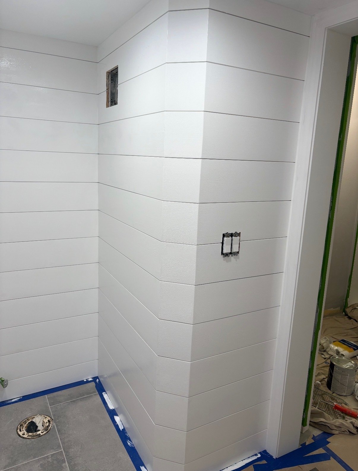 Shiplap wall installation in progress